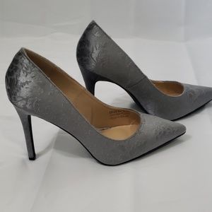 Penny Loves Kenny pumps.